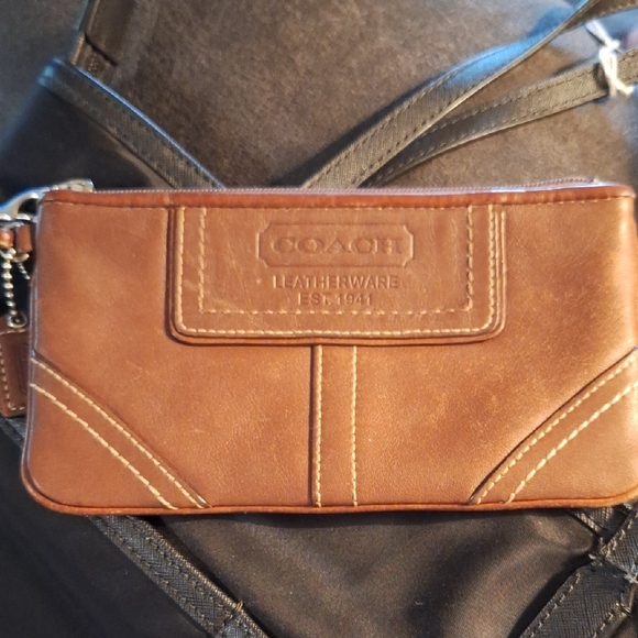 Coach Handbags - Coach Brown Leather Wristlet with Stitched Details